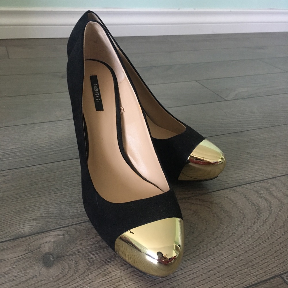 Black heels with gold cap and heels